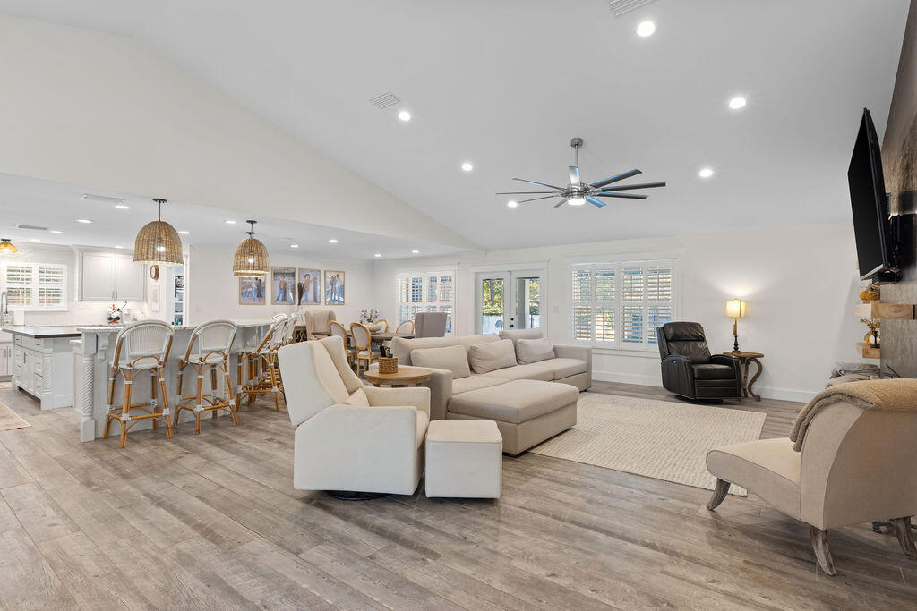 442 Shipwreck Road Santa Rosa Beach, FL 32459 - Photo 27 of 103 a living room with furniture kitchen view and a wooden floor