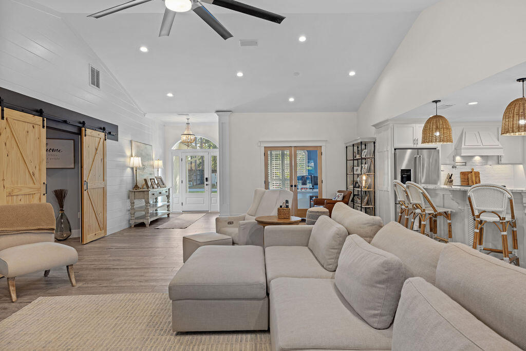 442 Shipwreck Road Santa Rosa Beach, FL 32459 - Photo 35 of 103 a living room with furniture and a large window
