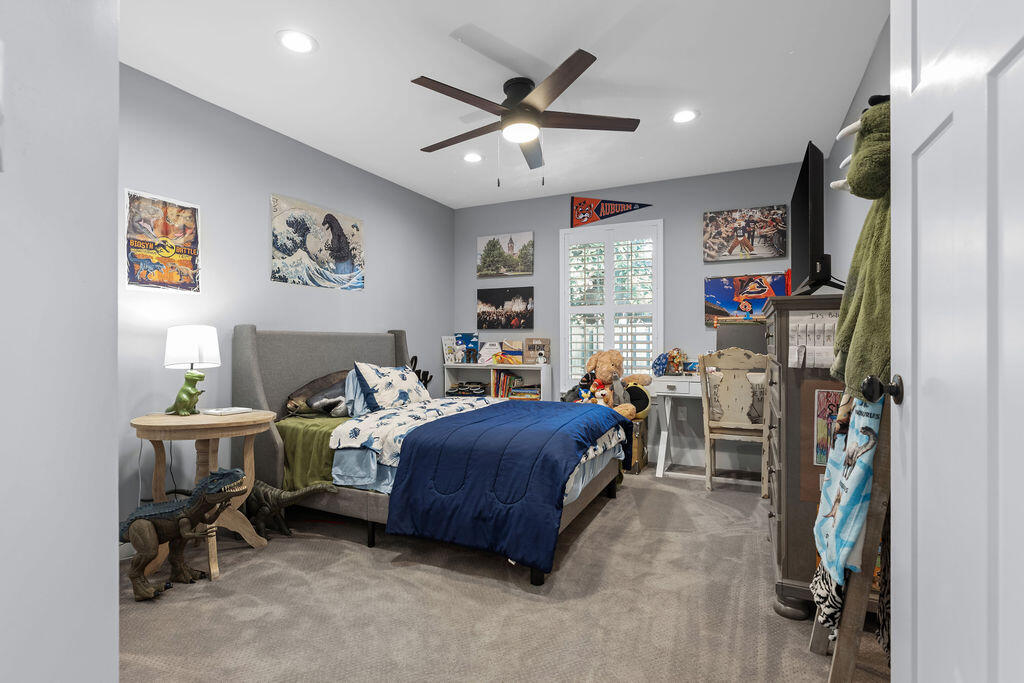 442 Shipwreck Road Santa Rosa Beach, FL 32459 - Photo 54 of 103 a living room with furniture a ceiling fan and a window