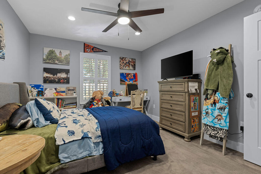 442 Shipwreck Road Santa Rosa Beach, FL 32459 - Photo 55 of 103 a bedroom with a bed and a flat tv screen on dresser