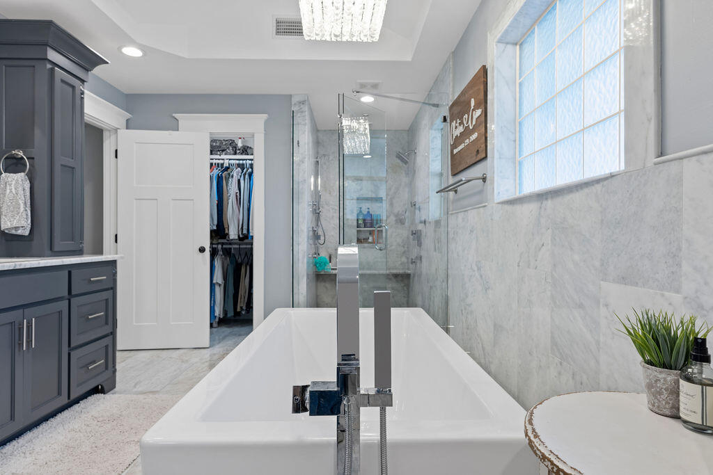 442 Shipwreck Road Santa Rosa Beach, FL 32459 - Photo 71 of 103 a spacious bathroom with a tub shower and sink