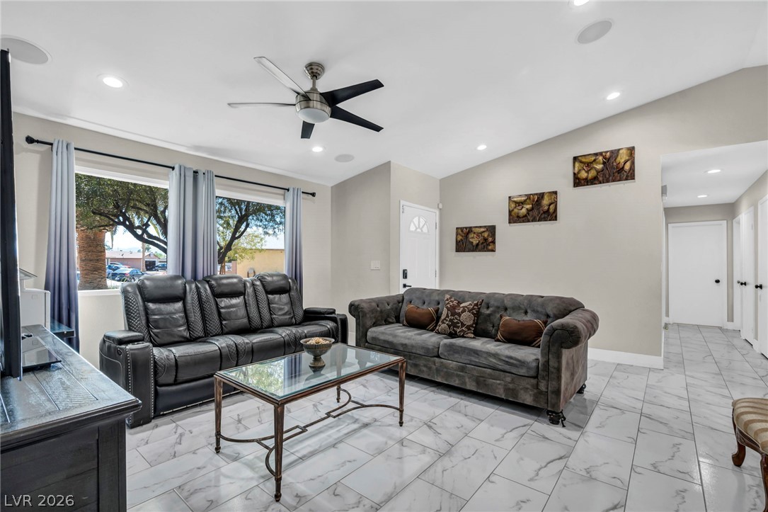 5882 Rio Tinto Way Las Vegas, NV 89110 - Photo 38 of 56 Step into this luminous living space featuring stylish tile flooring and recessed lighting.