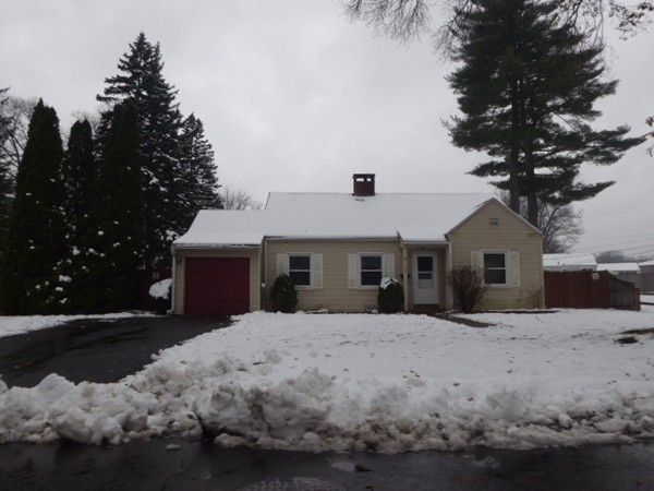 170 Brittany Road Springfield, MA 01151 - Photo 1 of 11 a front view of a house with a yard and garage