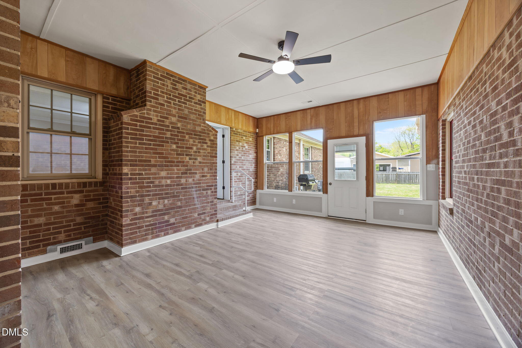 309 Rippling Stream Road Durham, NC 27704 - Photo 23 of 45 a view of an empty room with a window