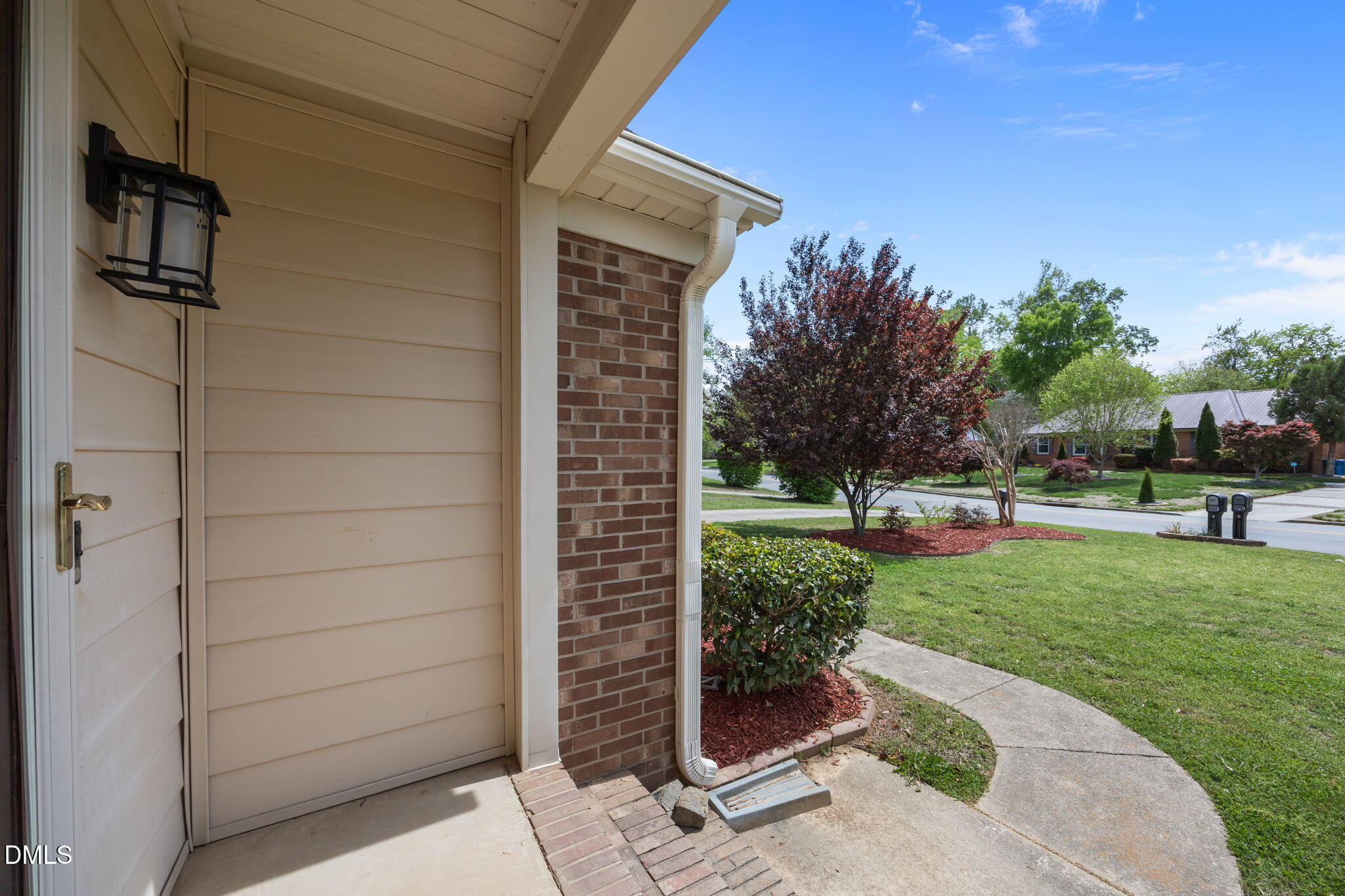 309 Rippling Stream Road Durham, NC 27704 - Photo 41 of 45 a view of backyard with sitting area