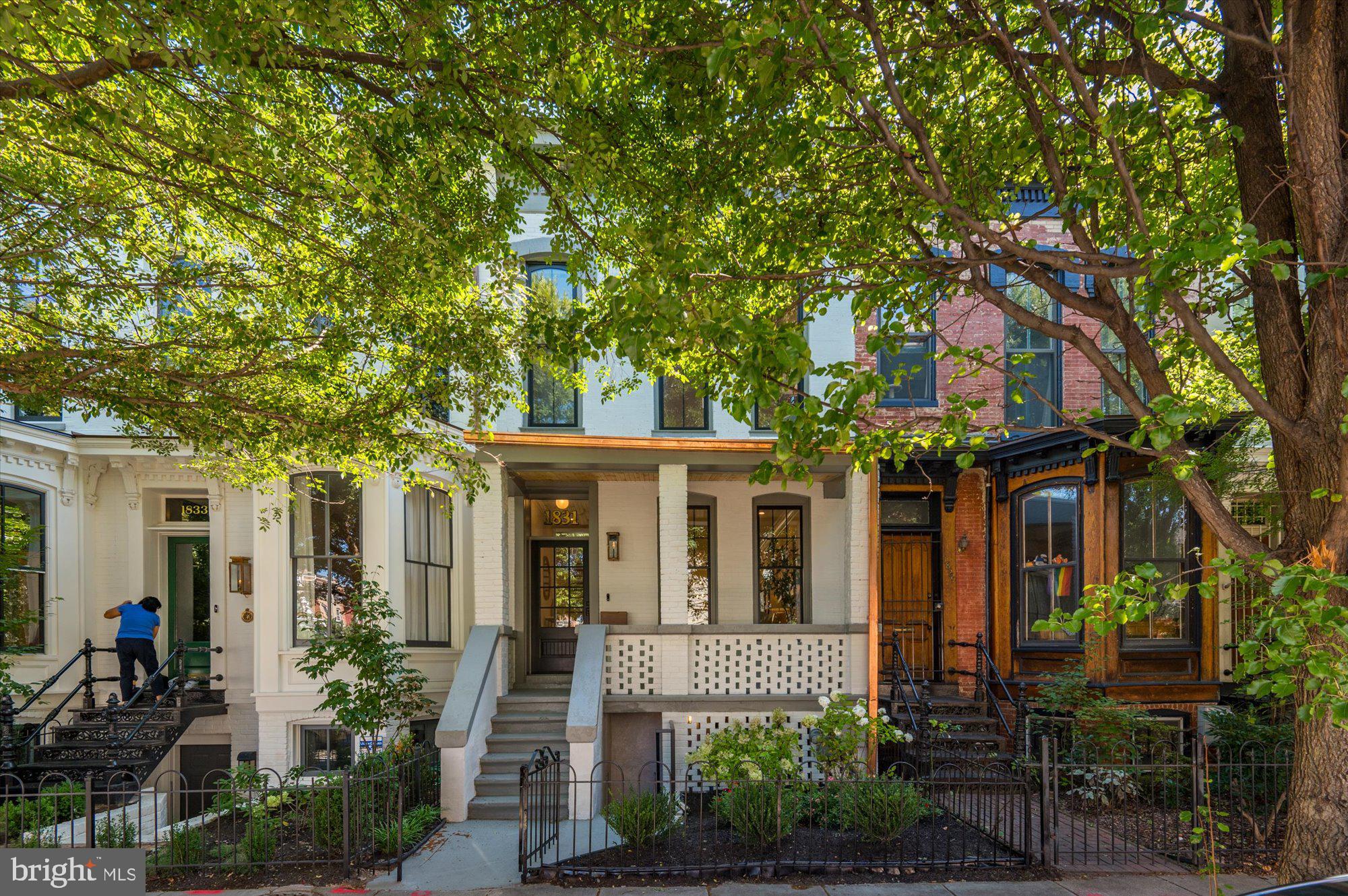 1831 12th Street Northwest Washington, DC 20009 - Photo 1 of 47 front view of a house with a tree
