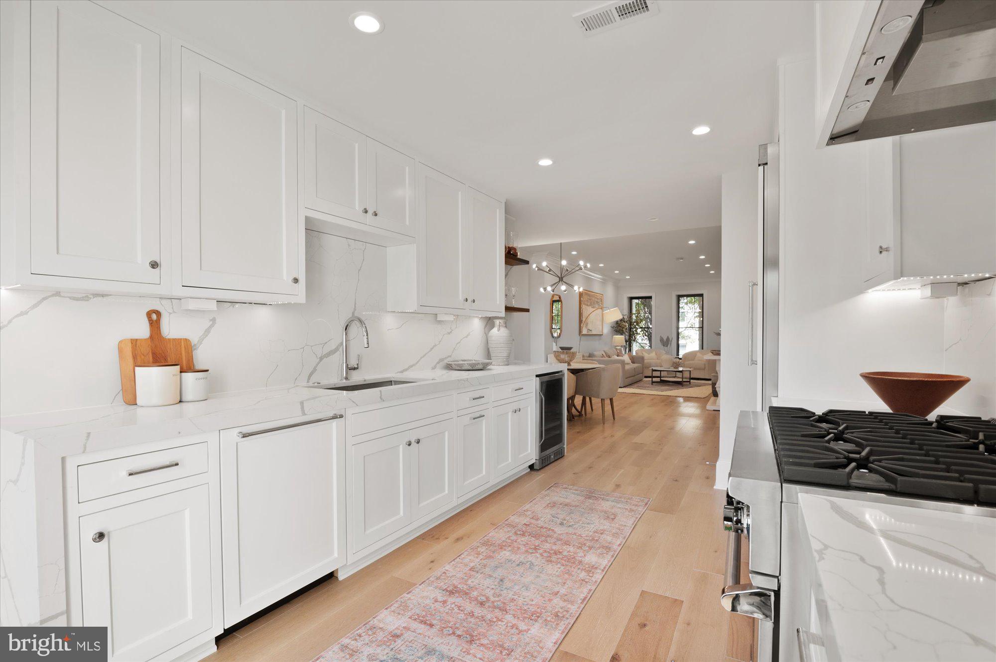 1831 12th Street Northwest Washington, DC 20009 - Photo 17 of 47 a kitchen with sink and cabinets