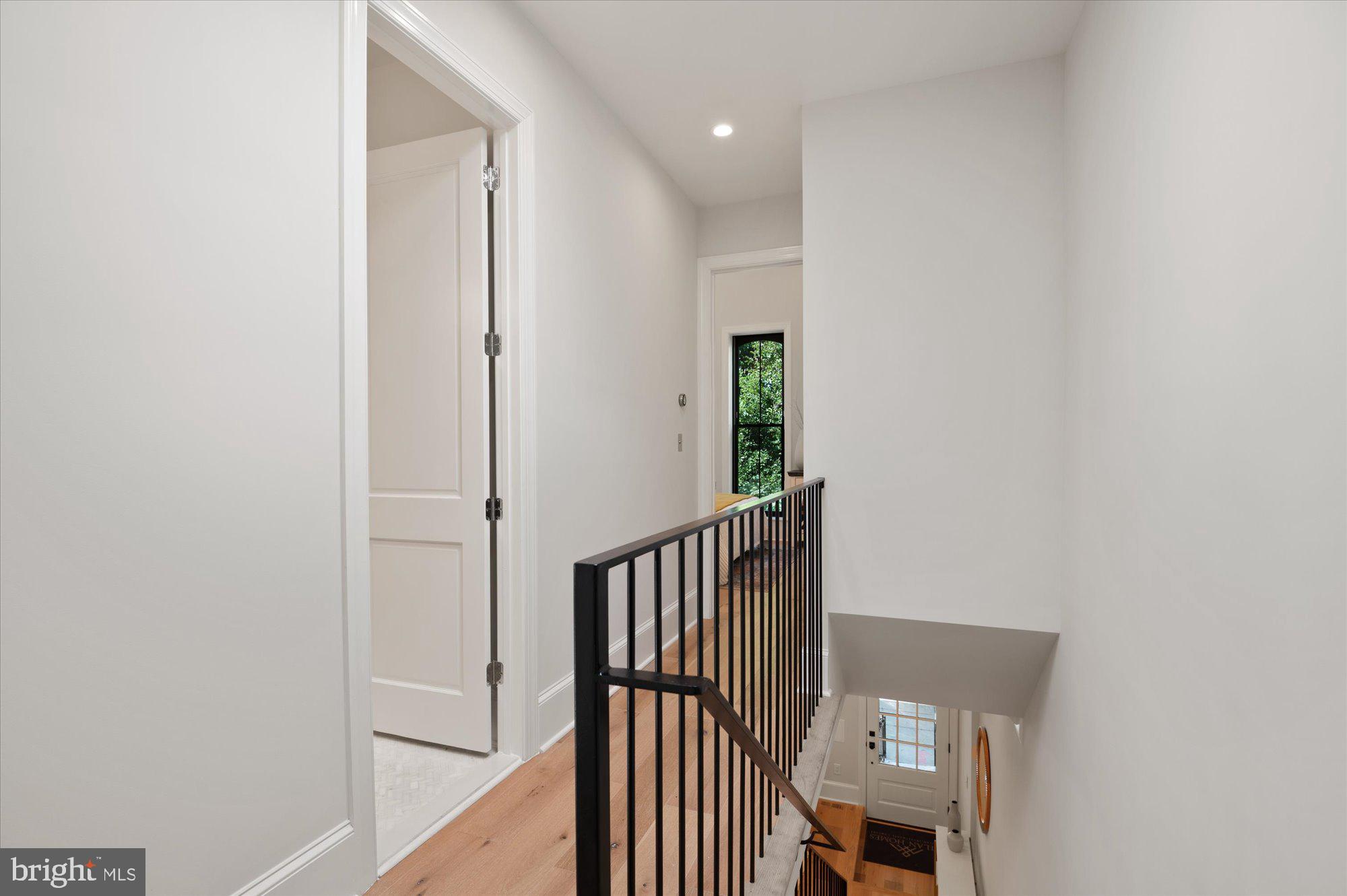 1831 12th Street Northwest Washington, DC 20009 - Photo 21 of 47 a view of a hallway with wooden floor and entryway