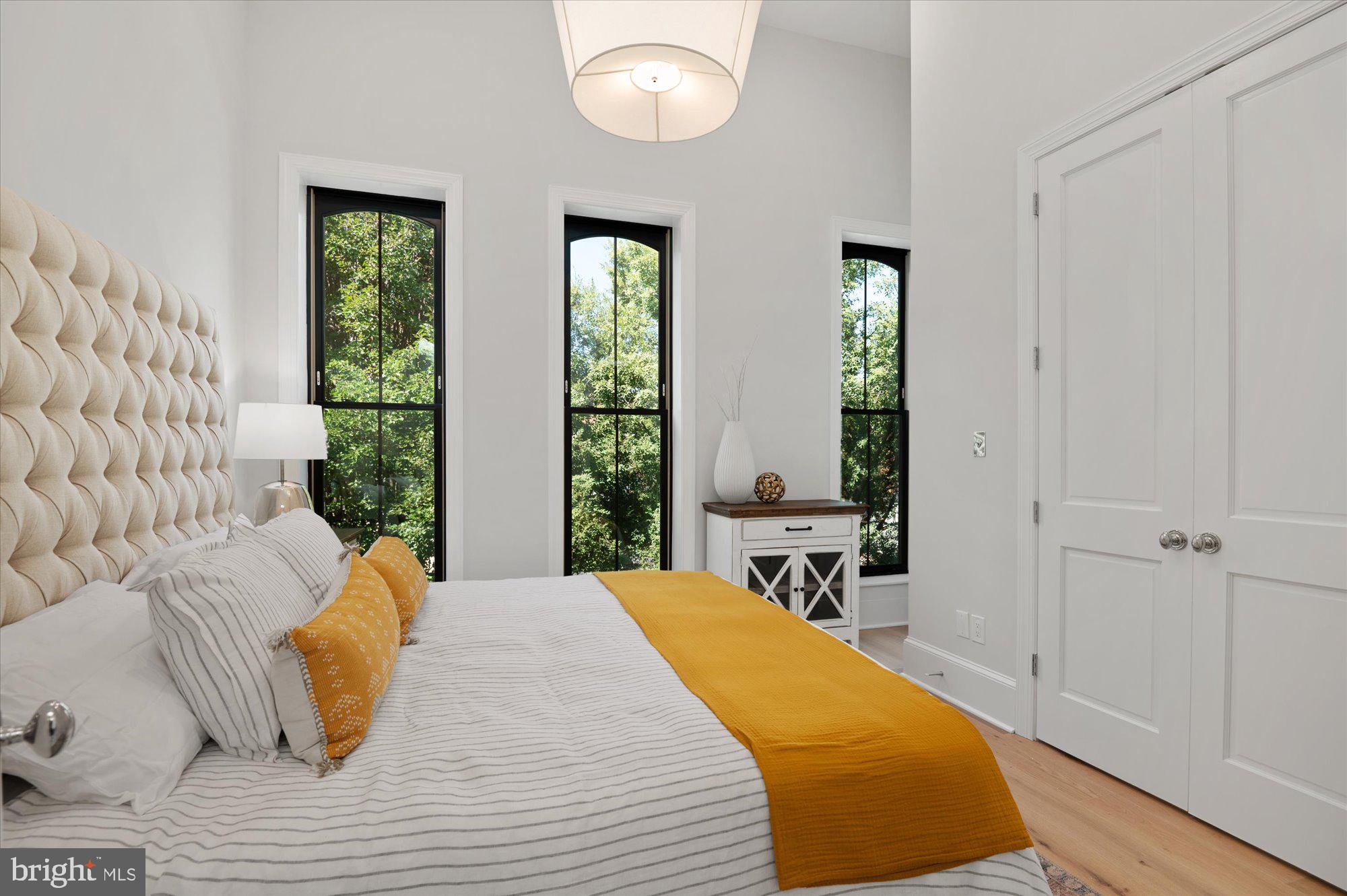 1831 12th Street Northwest Washington, DC 20009 - Photo 25 of 47 a bedroom with a bed and window