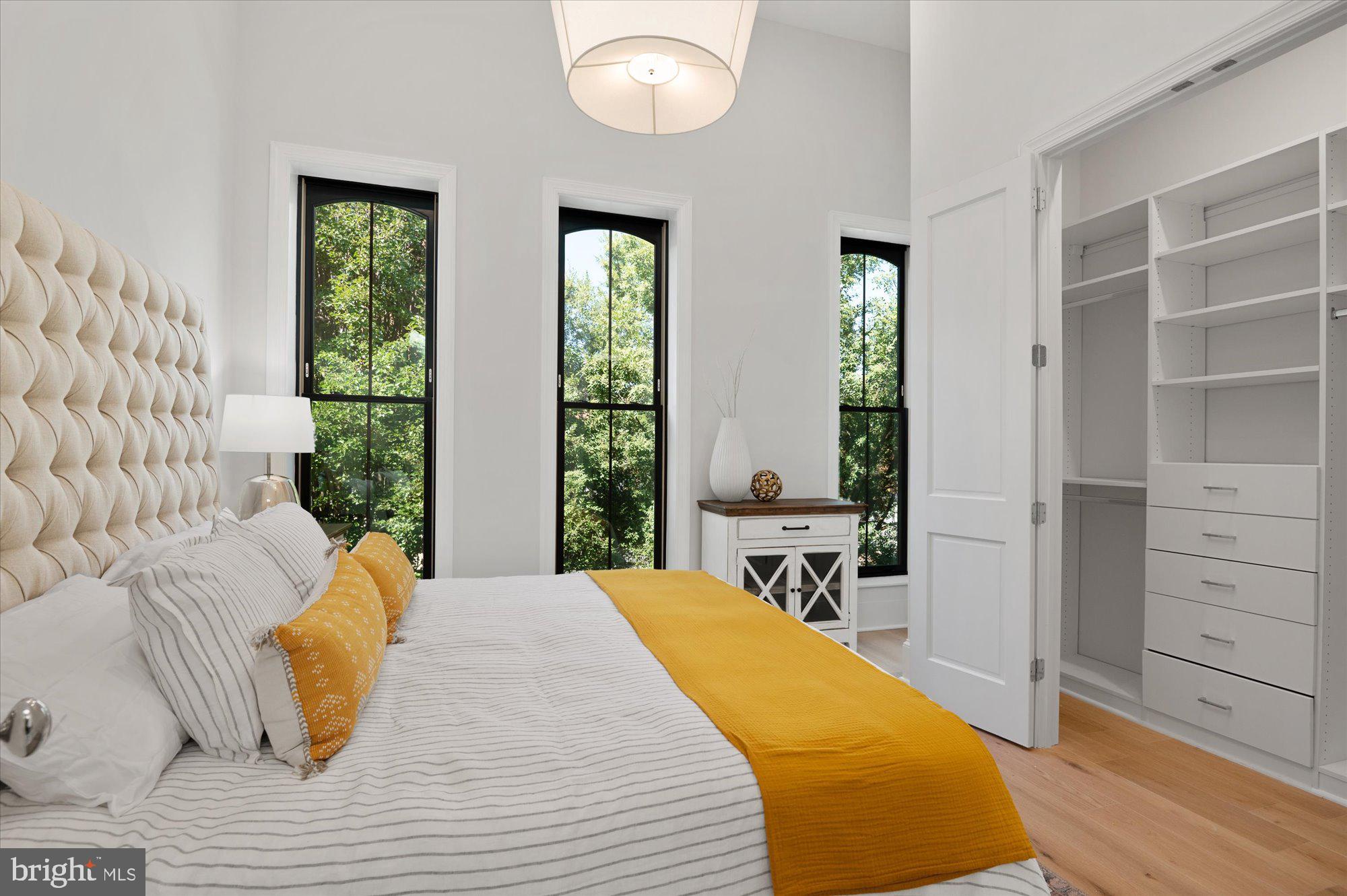 1831 12th Street Northwest Washington, DC 20009 - Photo 26 of 47 a bedroom with a bed and window