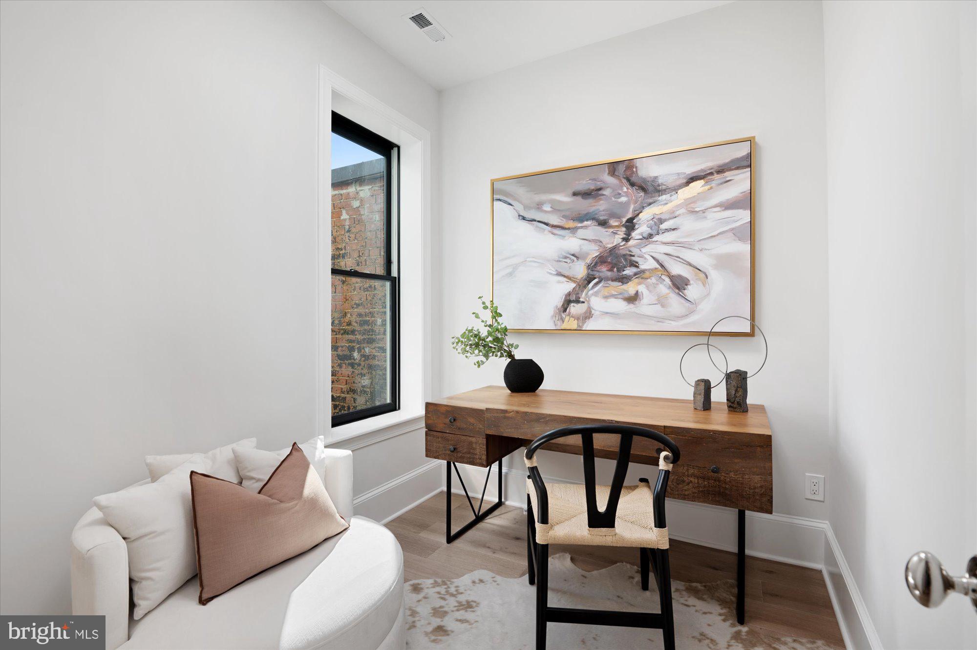 1831 12th Street Northwest Washington, DC 20009 - Photo 31 of 47 a dining room with furniture and window