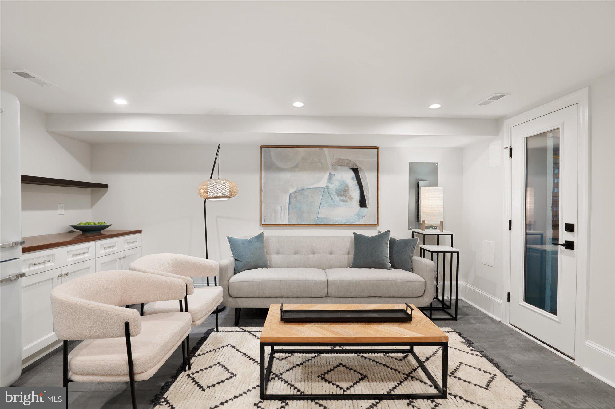 1831 12th Street Northwest Washington, DC 20009 - Photo 36 of 47 a living room with furniture and a table