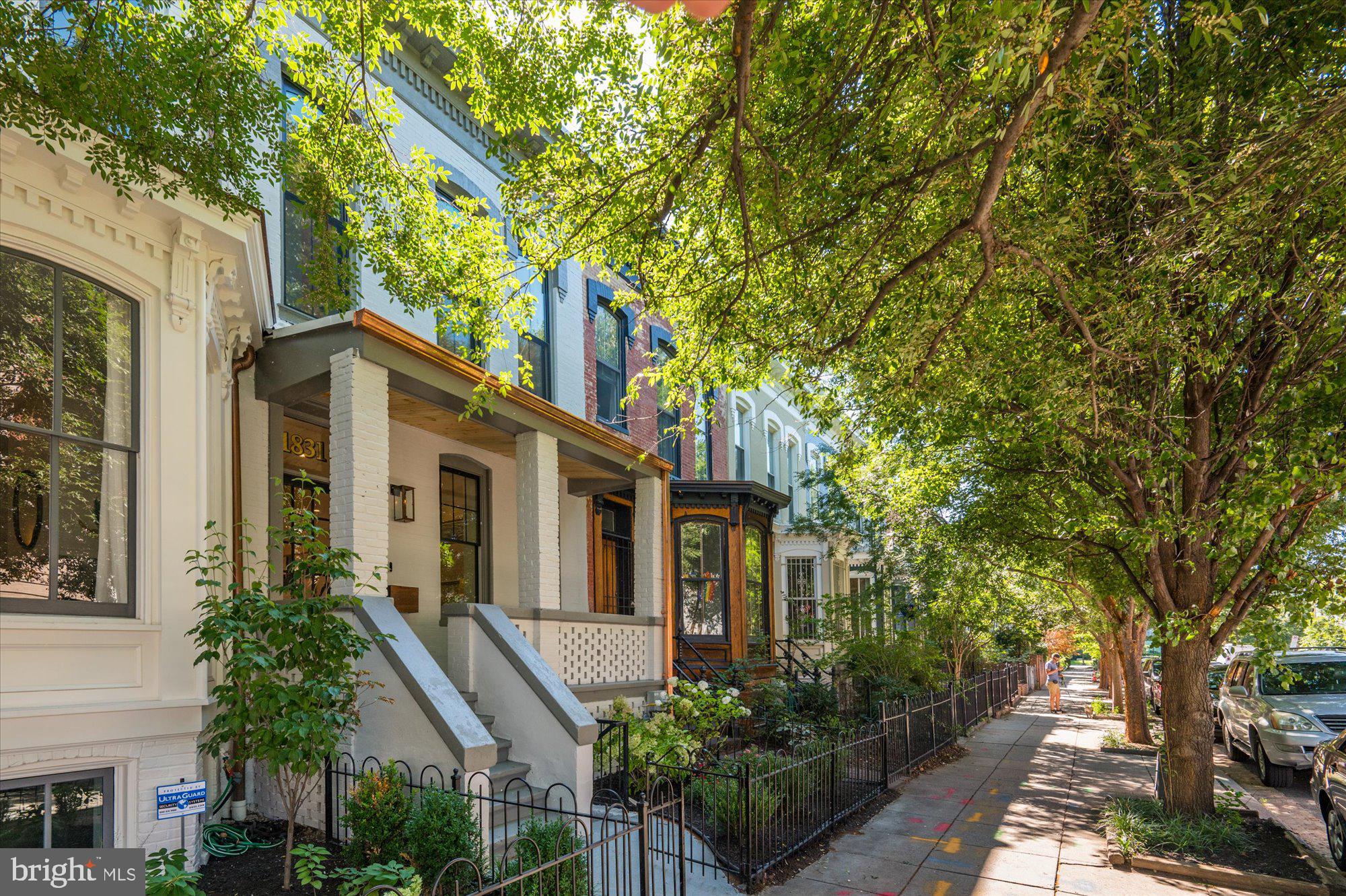 1831 12th Street Northwest Washington, DC 20009 - Photo 4 of 47 a front view of a house with a garden