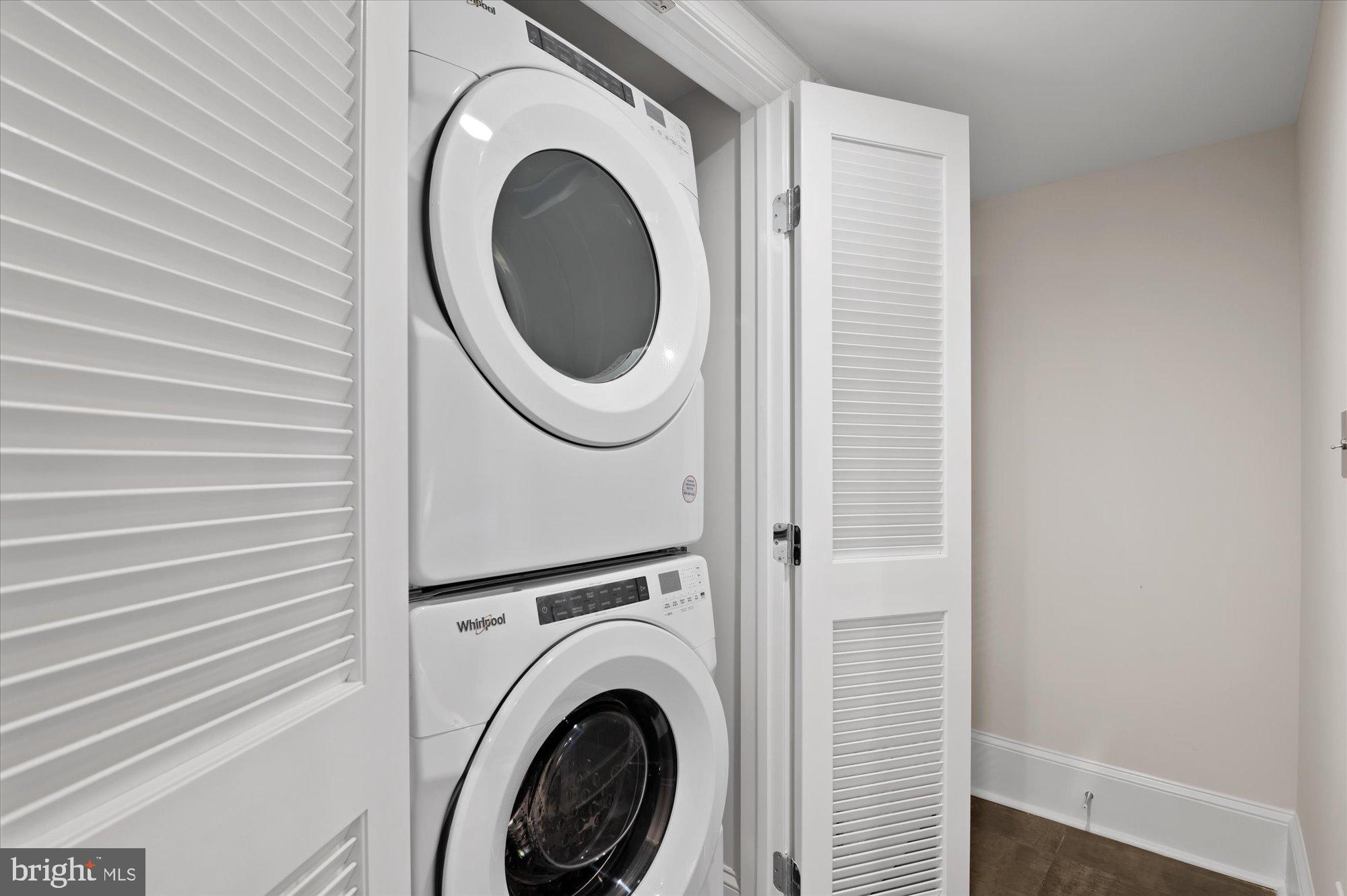 1831 12th Street Northwest Washington, DC 20009 - Photo 40 of 47 a close view of a utility room with dryer and washer