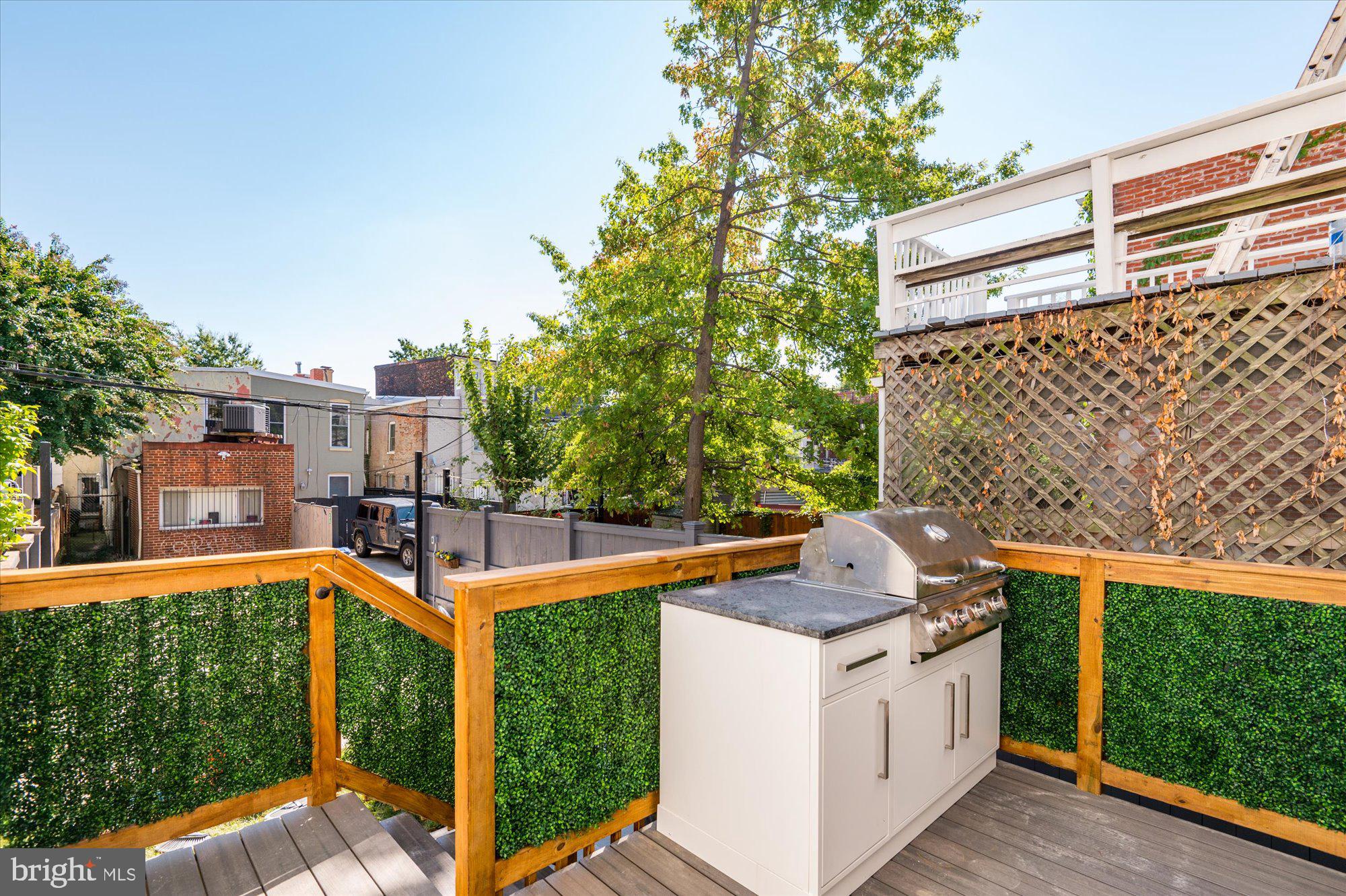 1831 12th Street Northwest Washington, DC 20009 - Photo 46 of 47 a view of a bench in the garden