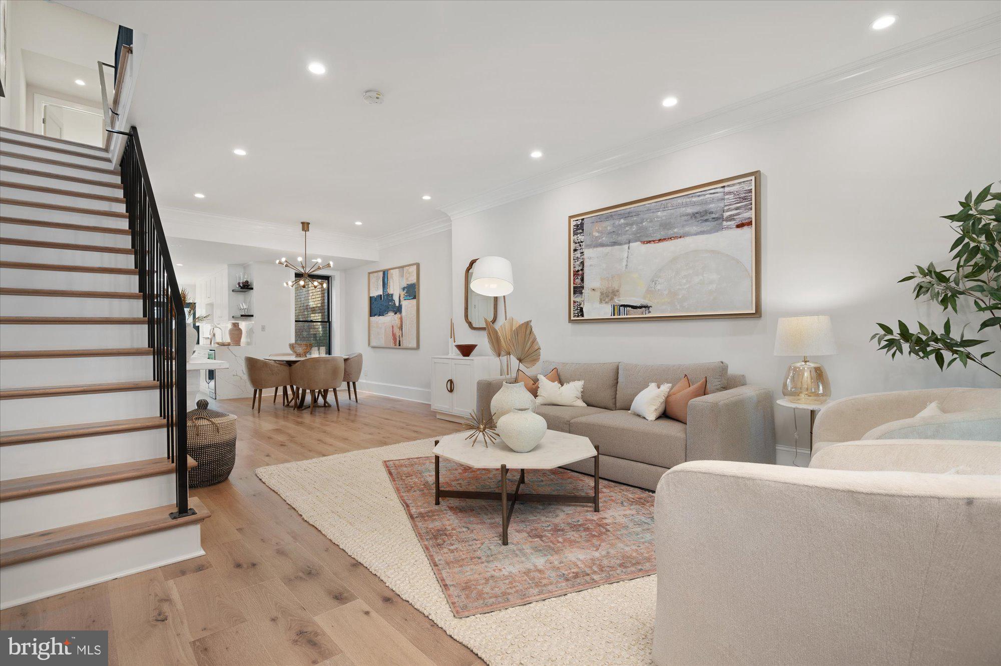 1831 12th Street Northwest Washington, DC 20009 - Photo 47 of 47 a living room with furniture flowerpot and wooden floor
