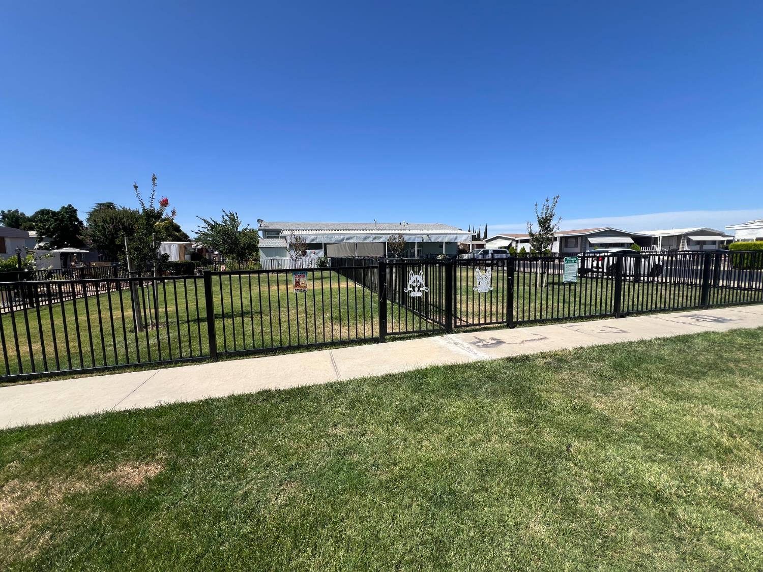 2240 Golden Oak Lane, Unit 83 Merced, CA 95341 - Photo 27 of 29 Secured dog park within the gated community