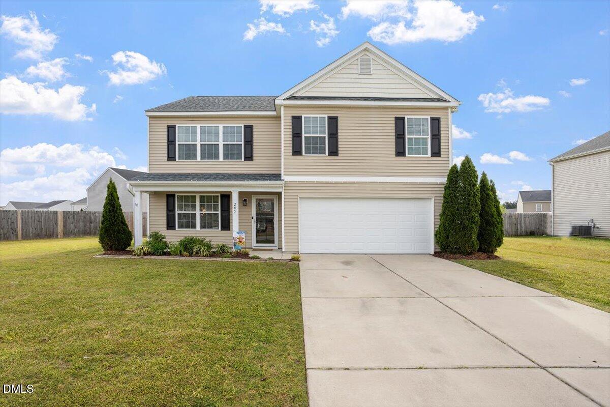 205 Battery Way Bunnlevel, NC 28323 - Photo 2 of 37 a front view of a house with a yard