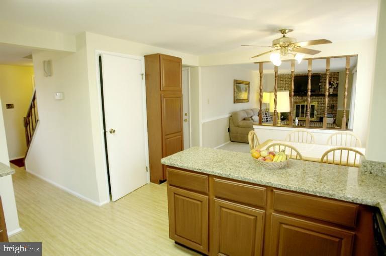 20700 Bell Bluff Road Gaithersburg, MD 20882 - Photo 11 of 30 Kitchen is open to the foyer and family room.