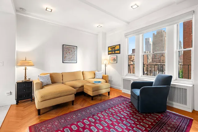a living room with furniture and a window