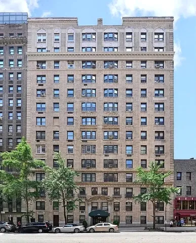 a view of a building with a street