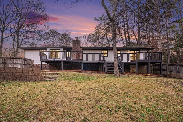 a house with trees in front of it