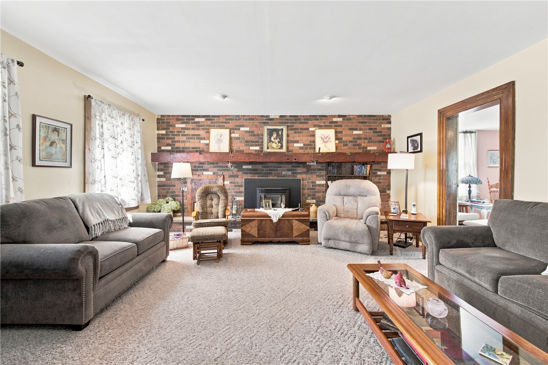 9463 Depew Road Pulteney, NY 14840 - Photo 24 of 50 cozy living room with pellet stove insert