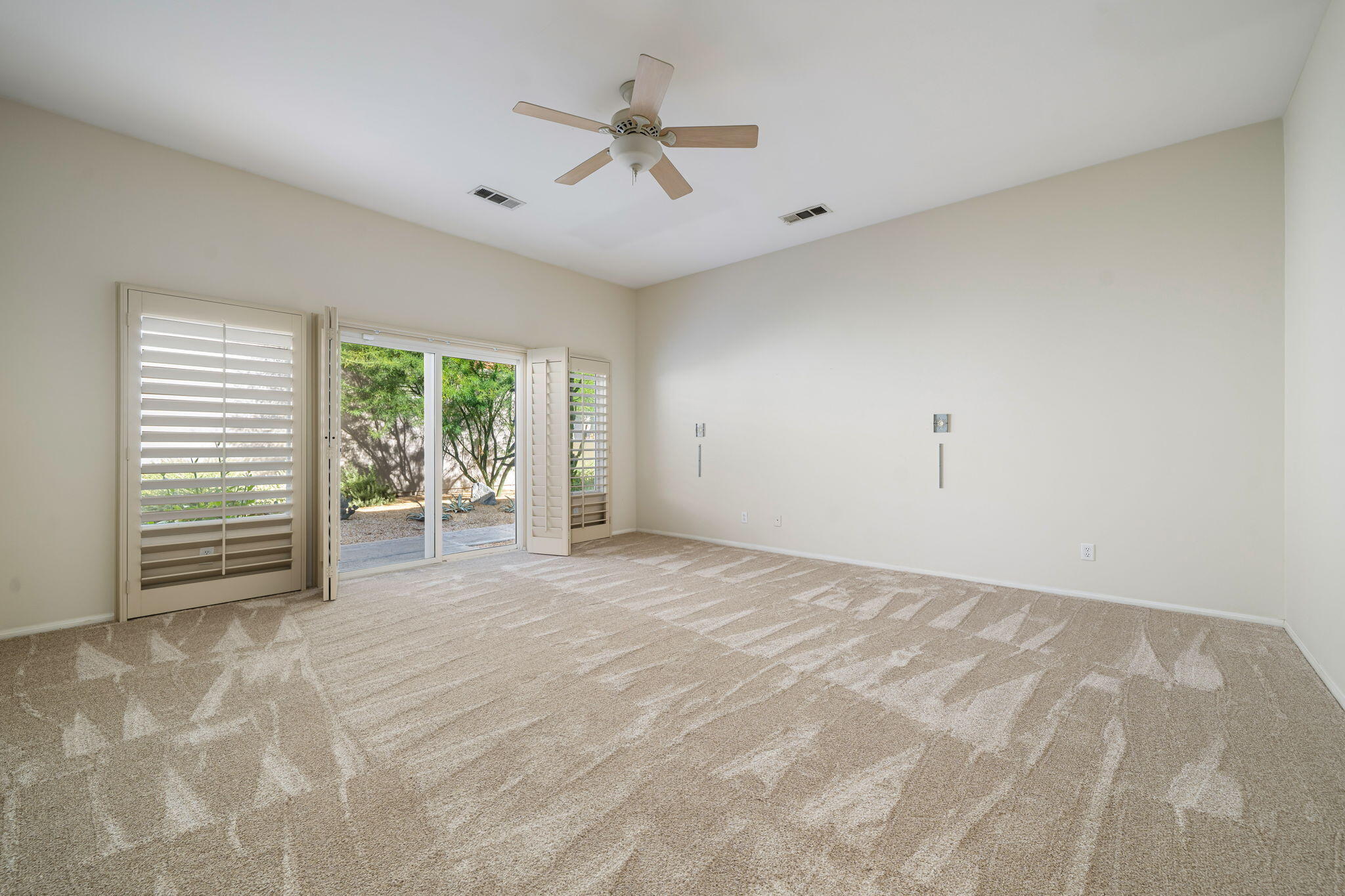 54275 Riviera La Quinta, CA 92253 - Photo 27 of 50 a view of an empty room with a window