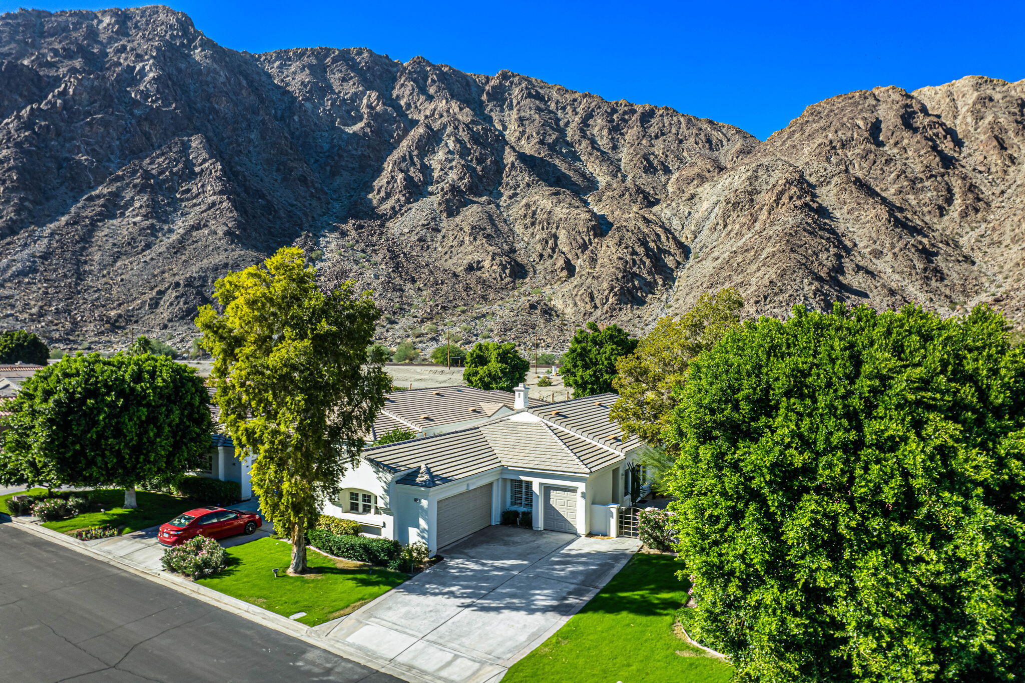 54275 Riviera La Quinta, CA 92253 - Photo 42 of 50 a aerial view of a house with a yard