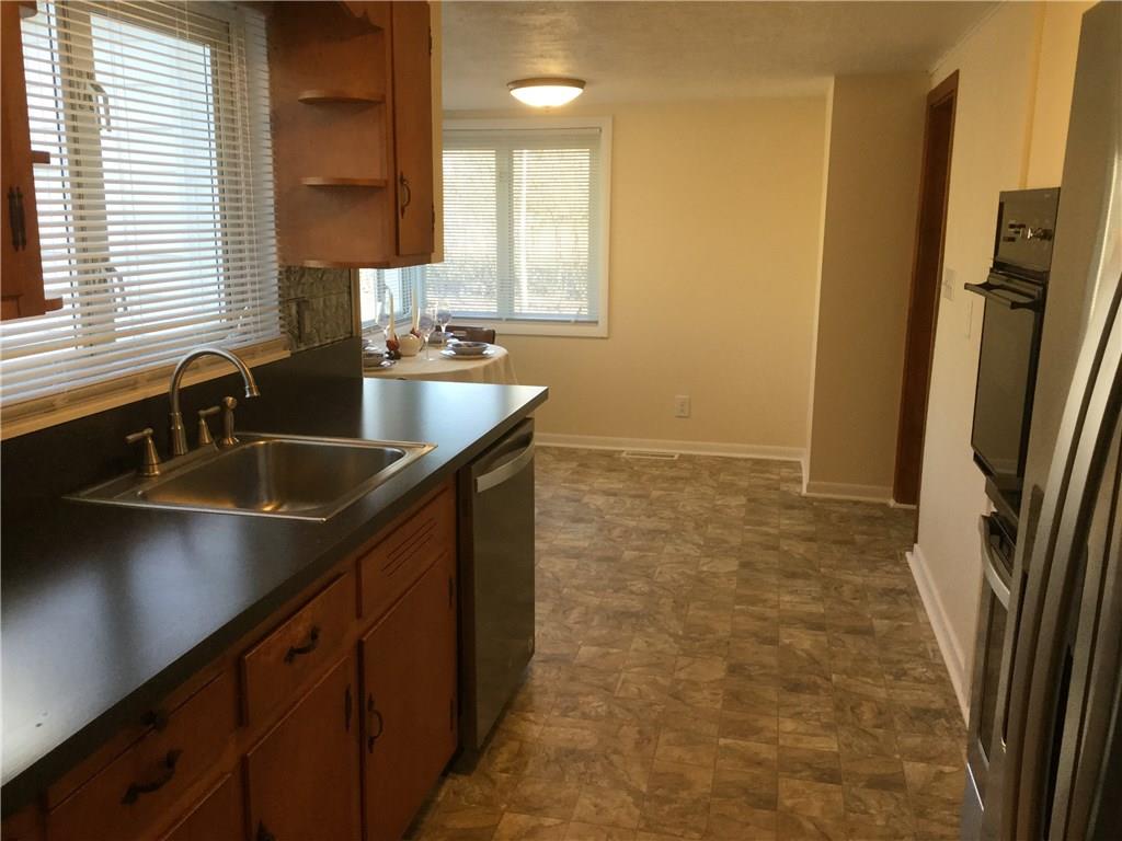 3779 Hubbard-Middlesex Road West Middlesex, PA 16159 - Photo 6 of 22 EAT-IN KITCHEN HAS NEW COUNTERTOP, SINK, APPLIANCES, FLOORING & MORE!