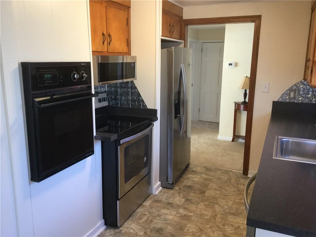 3779 Hubbard-Middlesex Road West Middlesex, PA 16159 - Photo 9 of 22 NEW SS ELEC RANGE, MICROWAVE OVEN AND REFRIGERATOR PLUS A SECOND OVEN THAT'S BUILT-IN.