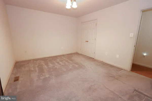 a room with furniture and a window