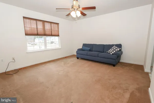 a kitchen with stainless steel appliances a sink stove and cabinets