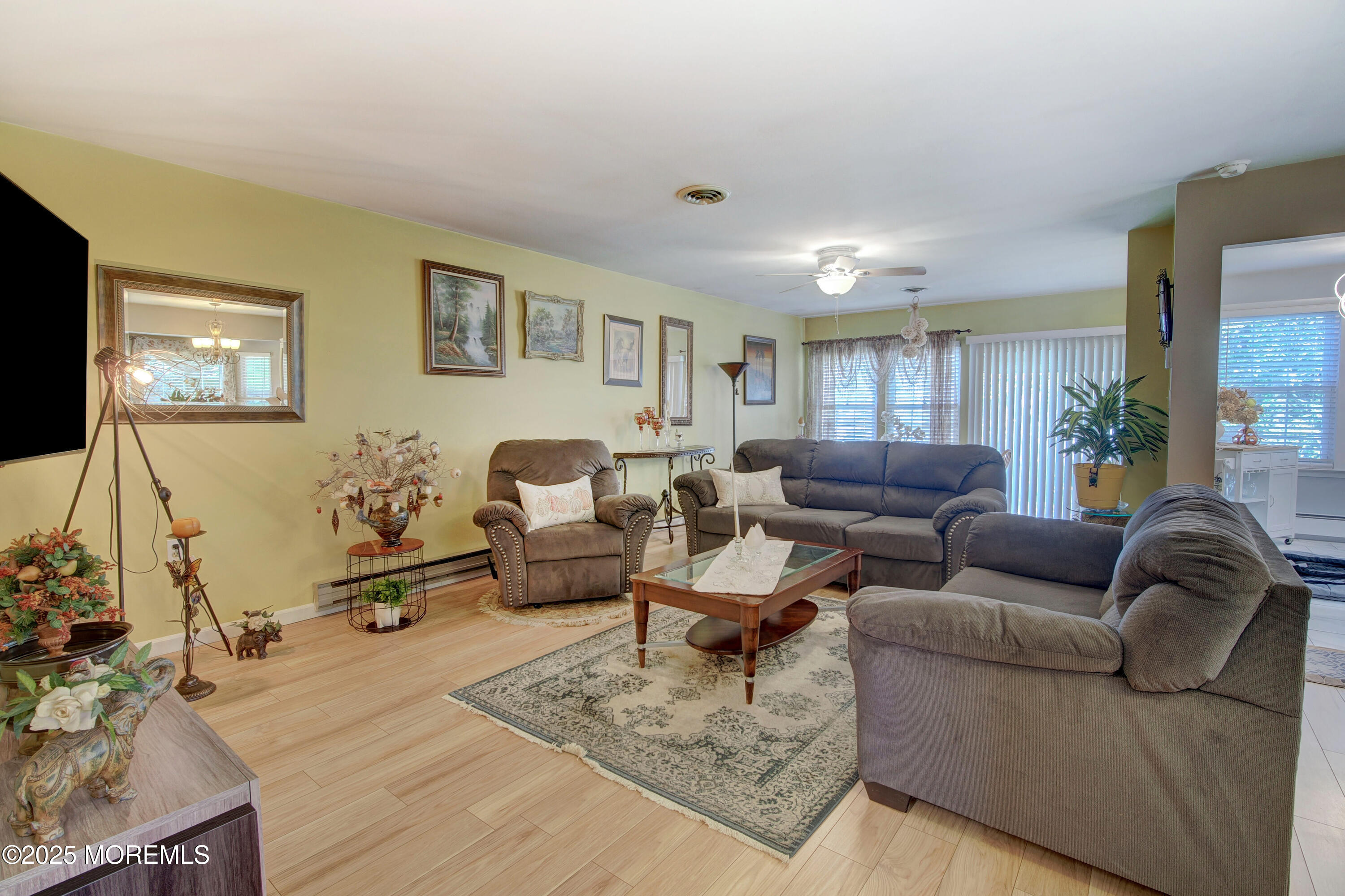 8B Alpine Road, Unit C Whiting, NJ 08759 - Photo 11 of 23 a living room with furniture and a flat screen tv