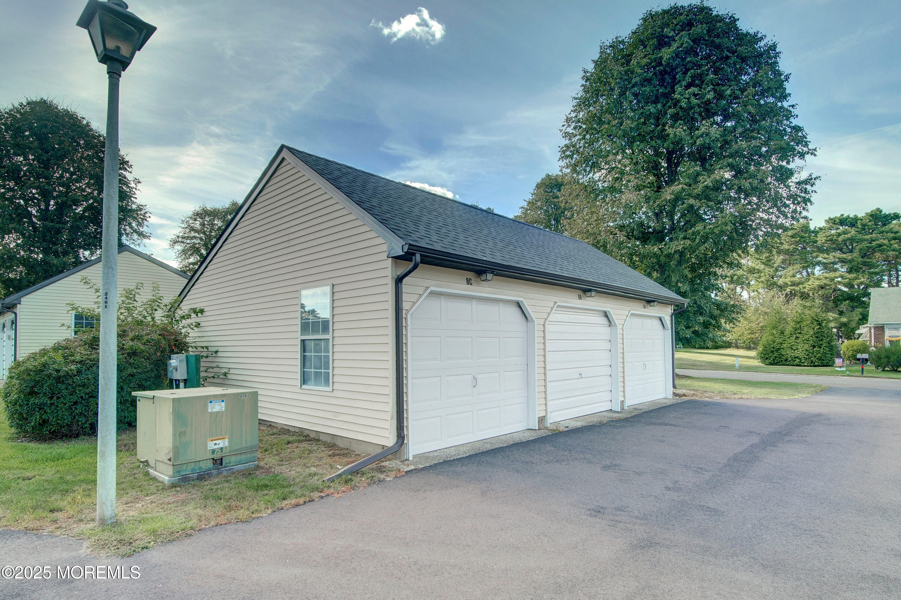 8B Alpine Road, Unit C Whiting, NJ 08759 - Photo 22 of 23 a view of a house with backyard