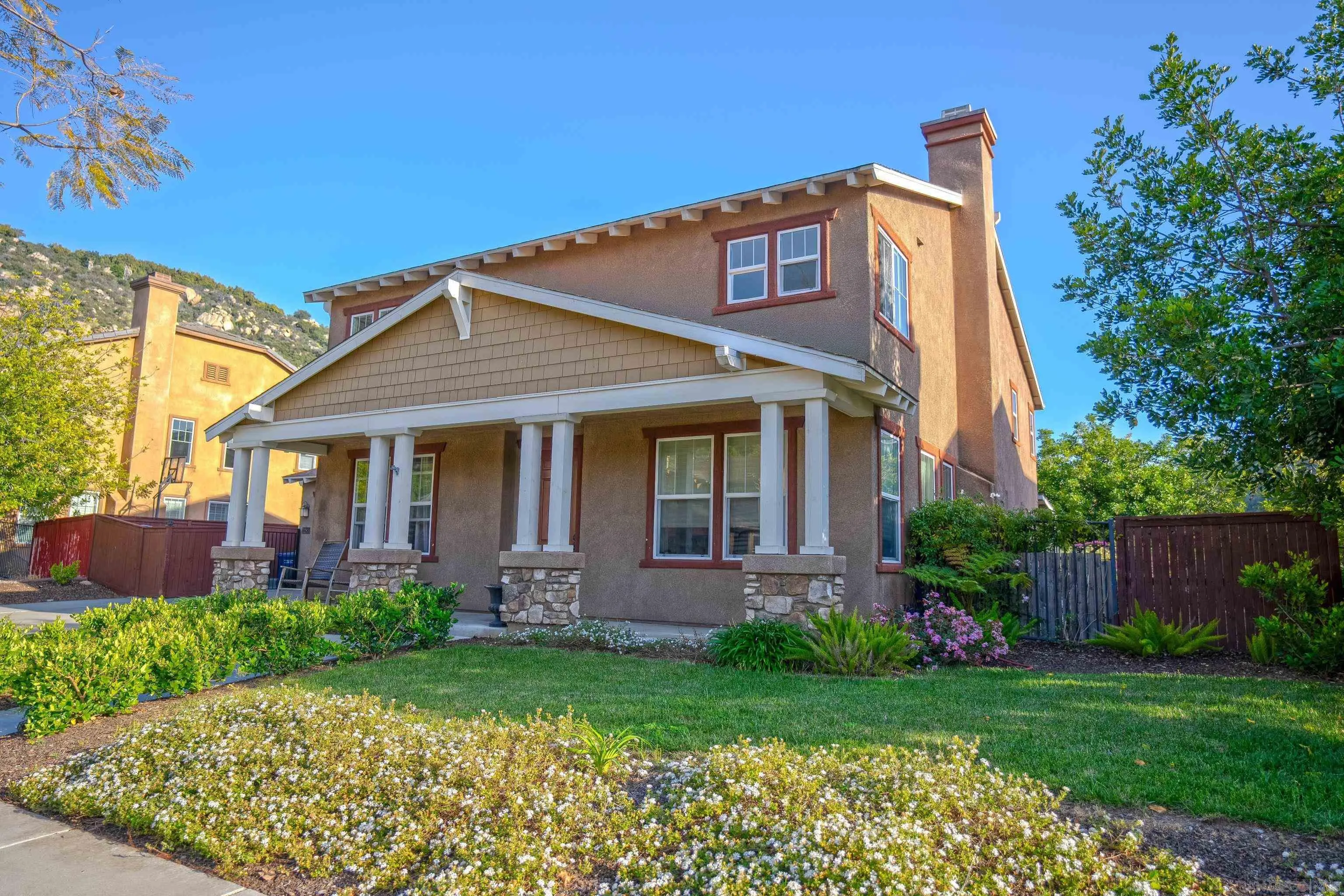 front view of a house with a yard