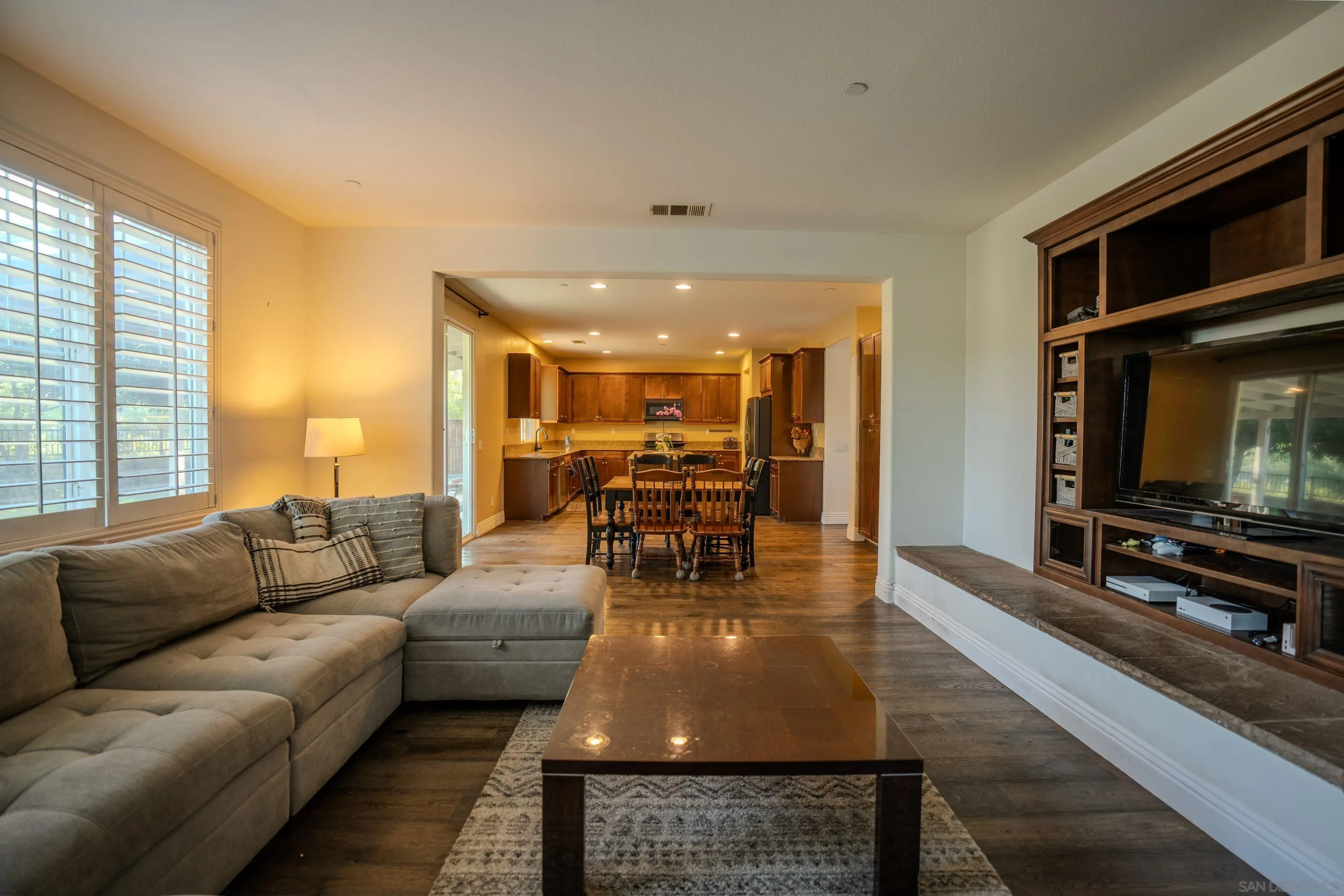 3283 Beven Drive Escondido, CA 92027 - Photo 18 of 64 a living room with furniture and a flat screen tv