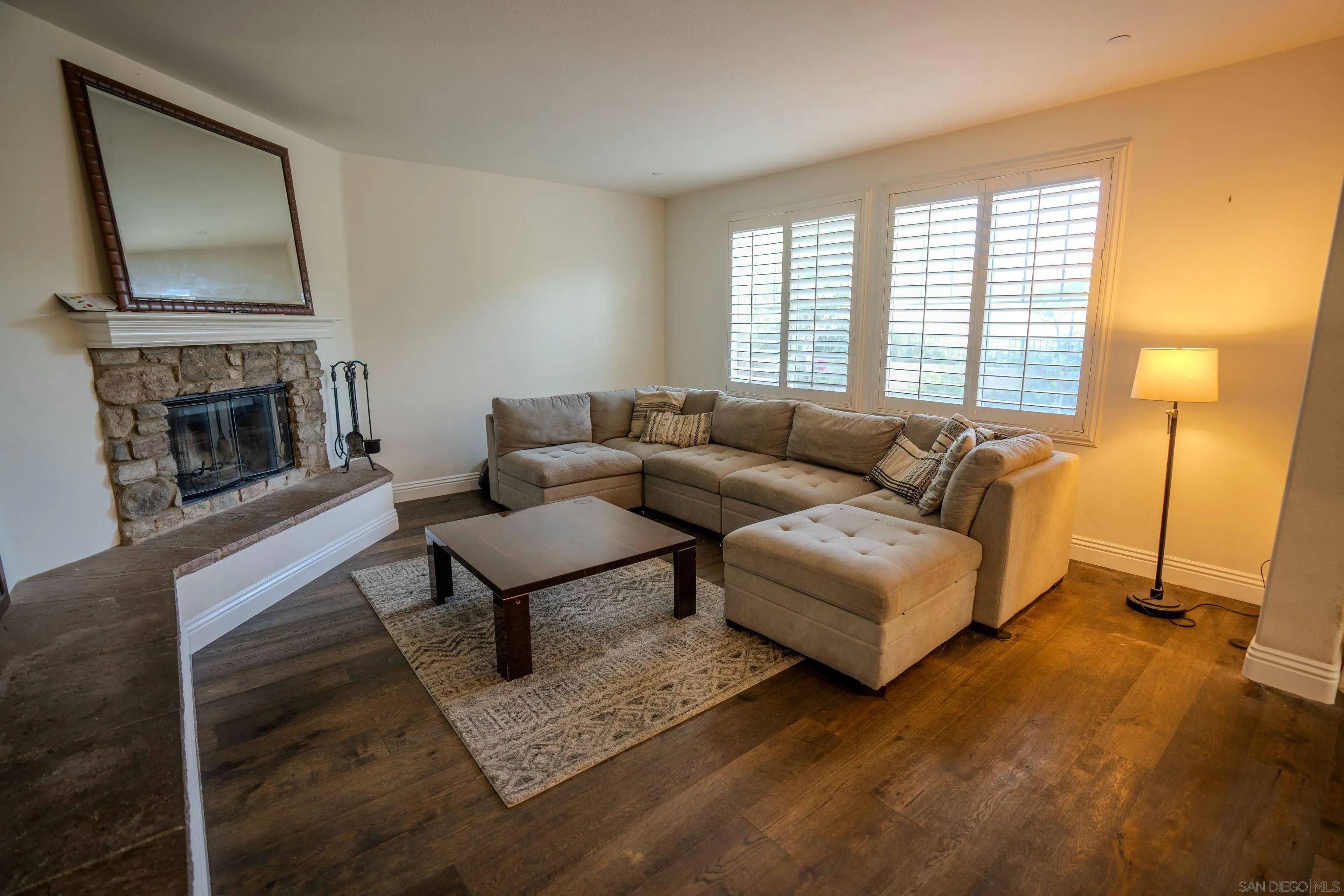 3283 Beven Drive Escondido, CA 92027 - Photo 19 of 64 a living room with furniture and a fireplace