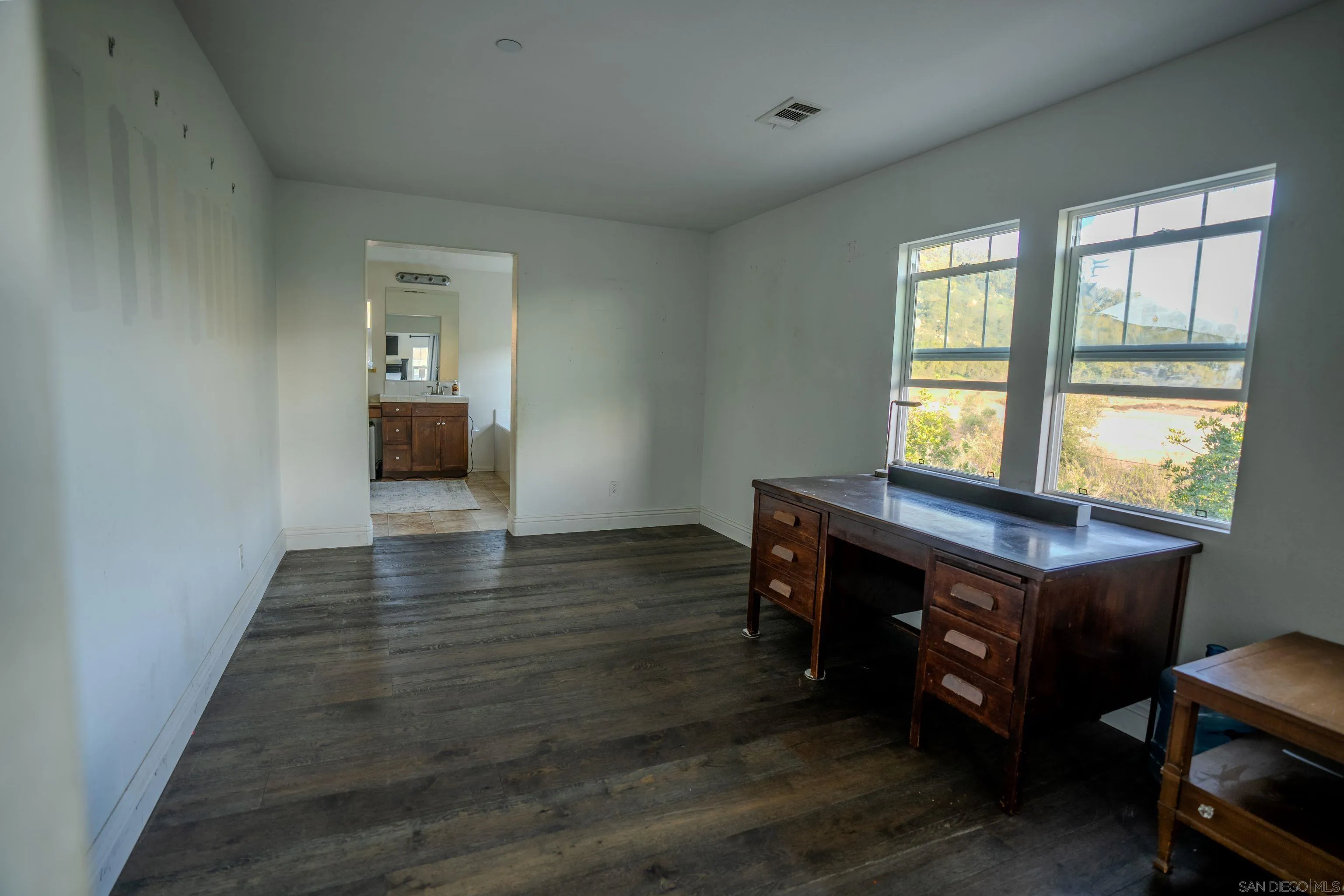 3283 Beven Drive Escondido, CA 92027 - Photo 26 of 64 a room with furniture and a window
