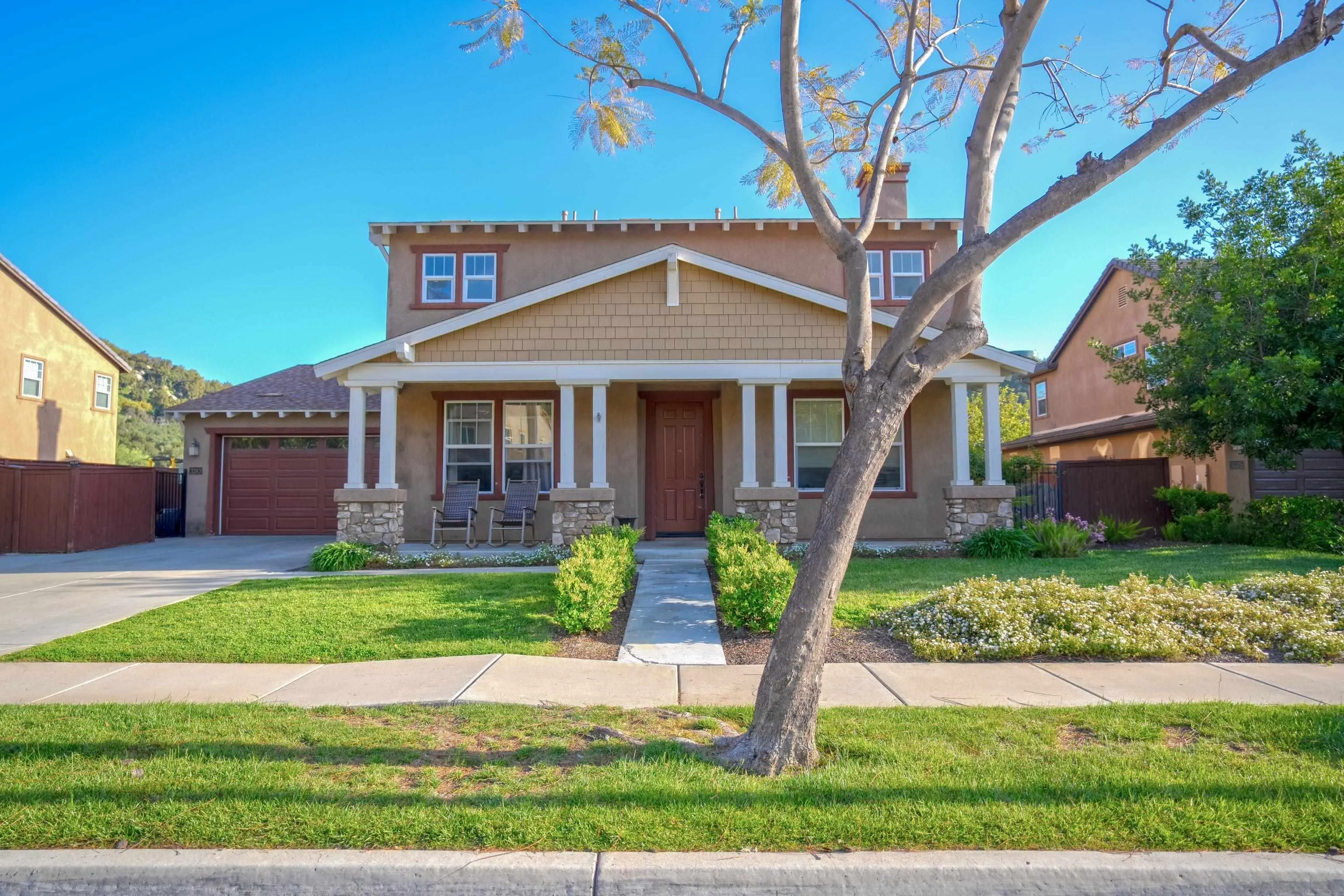 3283 Beven Drive Escondido, CA 92027 - Photo 3 of 64 a front view of a house with a yard