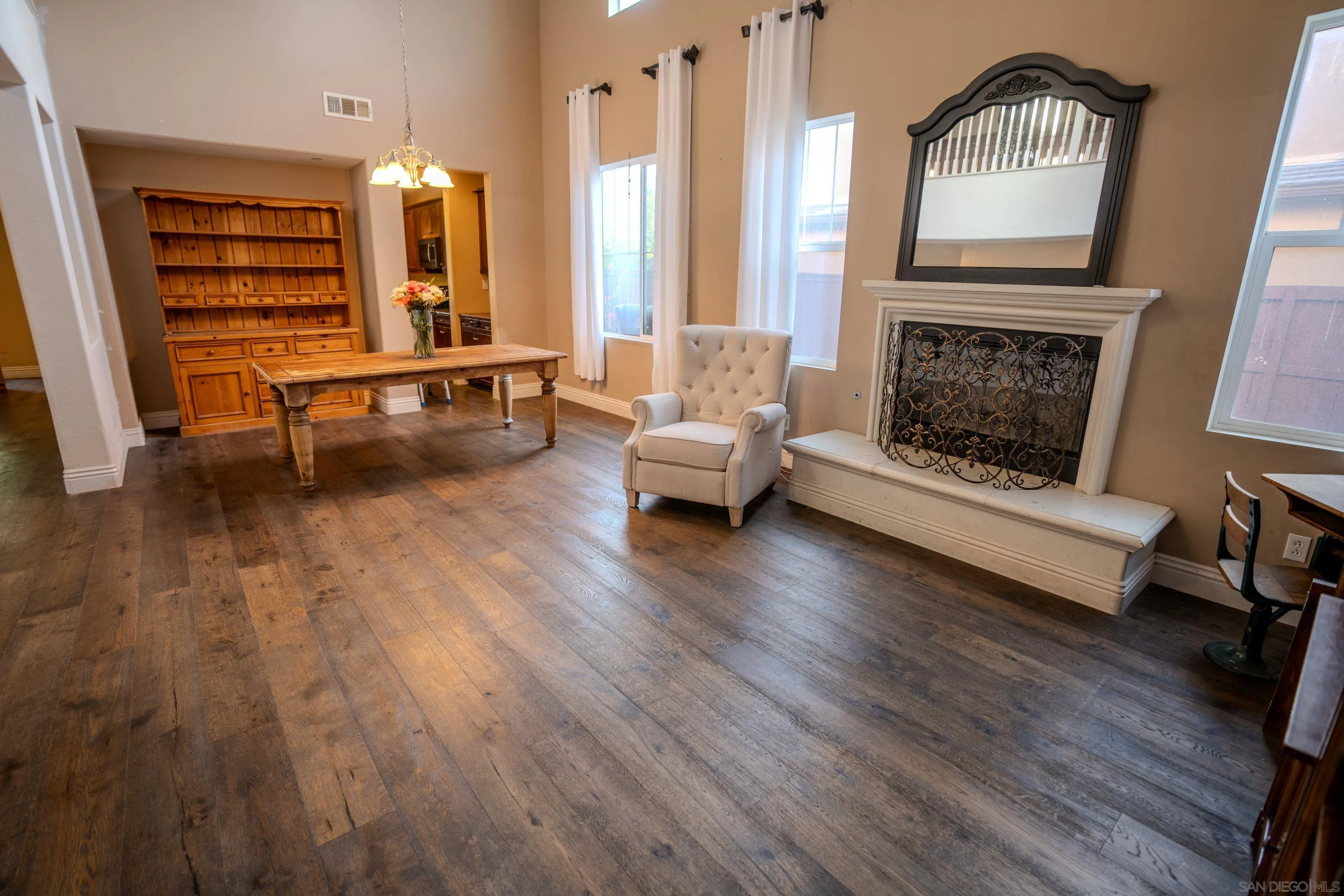 3283 Beven Drive Escondido, CA 92027 - Photo 8 of 64 a living room with furniture and a fireplace