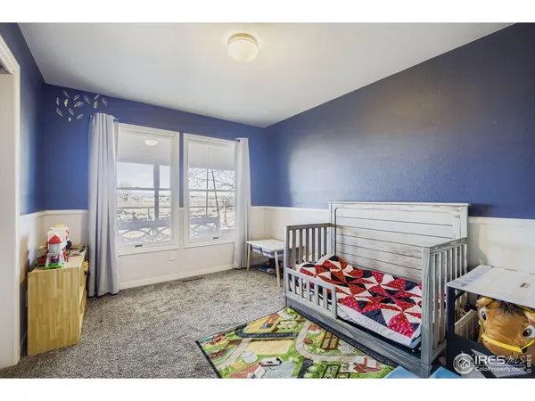 a view of a livingroom with furniture and a couch