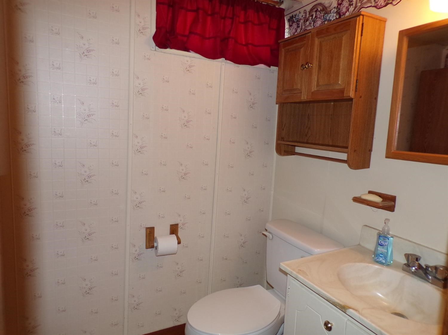 3514 Windsor Road Michigan City, IN 46360 - Photo 25 of 32 a bathroom with a sink toilet and vanity