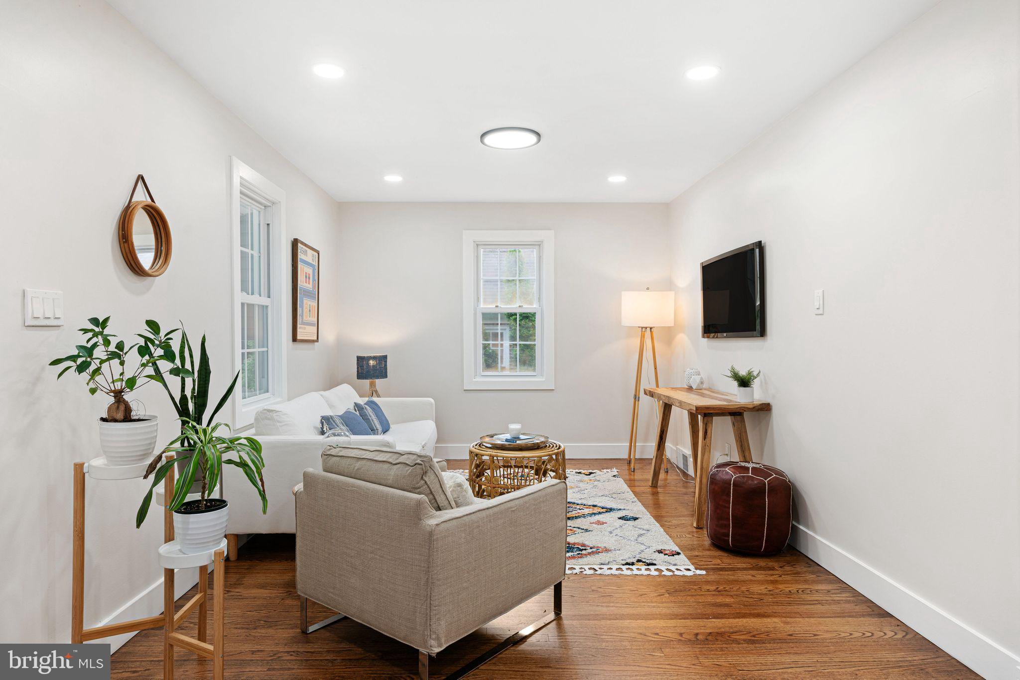 116 Rhoads Avenue Haddonfield, NJ 08033 - Photo 11 of 29 a living room with furniture and a flat screen tv