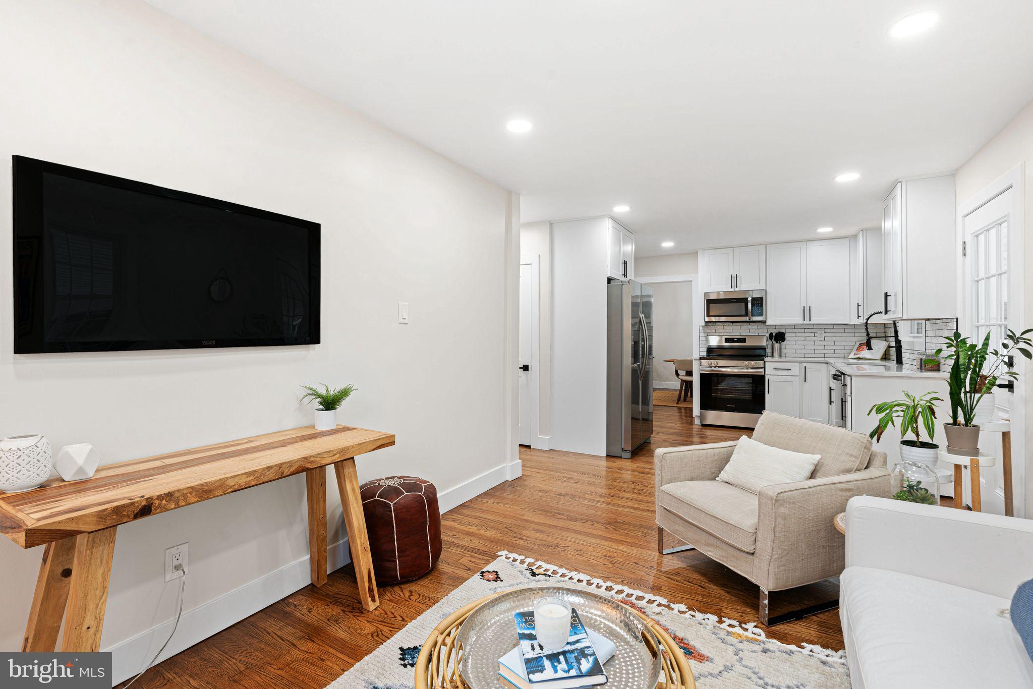 116 Rhoads Avenue Haddonfield, NJ 08033 - Photo 12 of 29 a living room with furniture and a flat screen tv