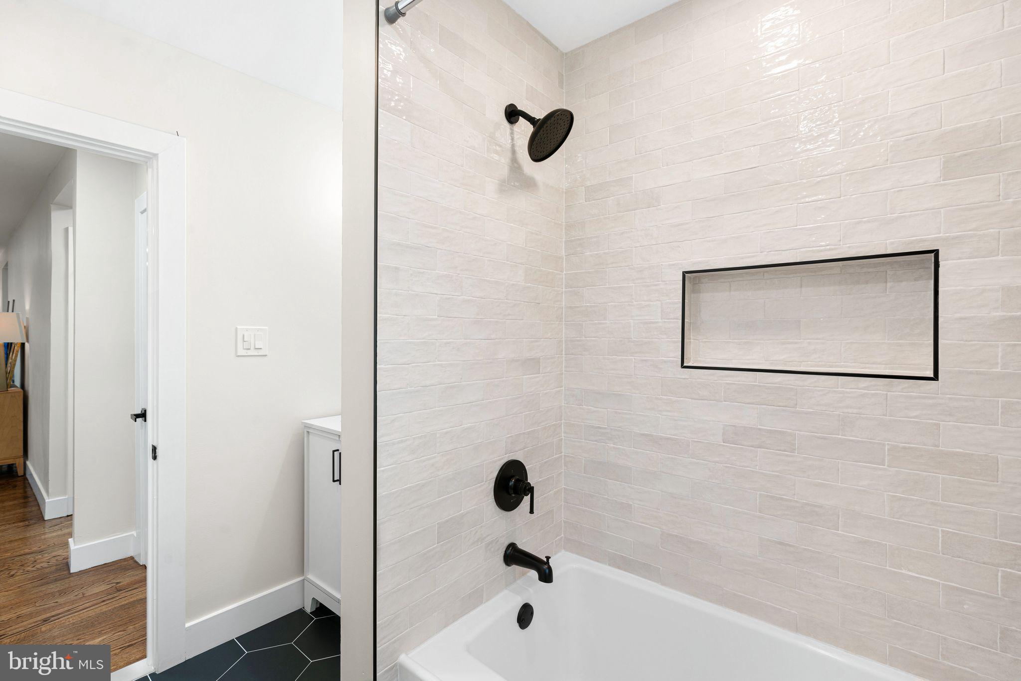 116 Rhoads Avenue Haddonfield, NJ 08033 - Photo 16 of 29 a bathroom with a shower and a sink