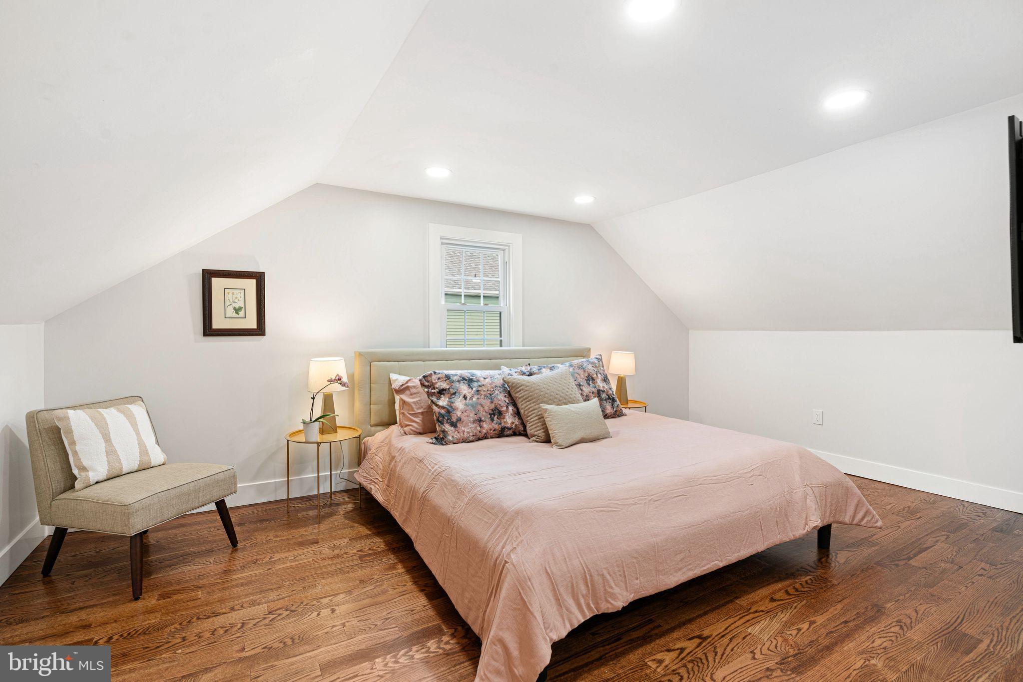 116 Rhoads Avenue Haddonfield, NJ 08033 - Photo 17 of 29 a bedroom with a bed and chair