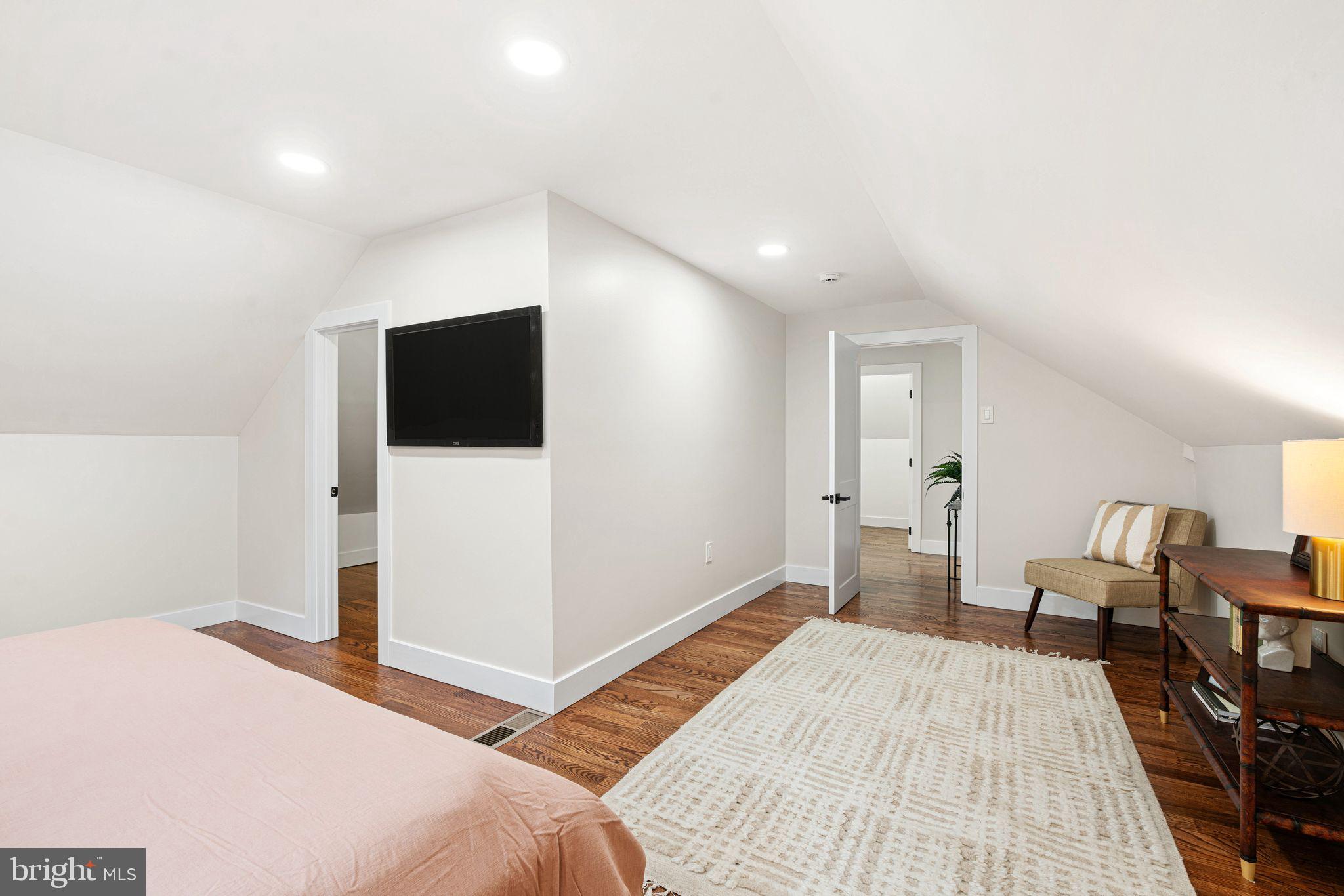 116 Rhoads Avenue Haddonfield, NJ 08033 - Photo 18 of 29 a bedroom with a bed and a flat screen tv