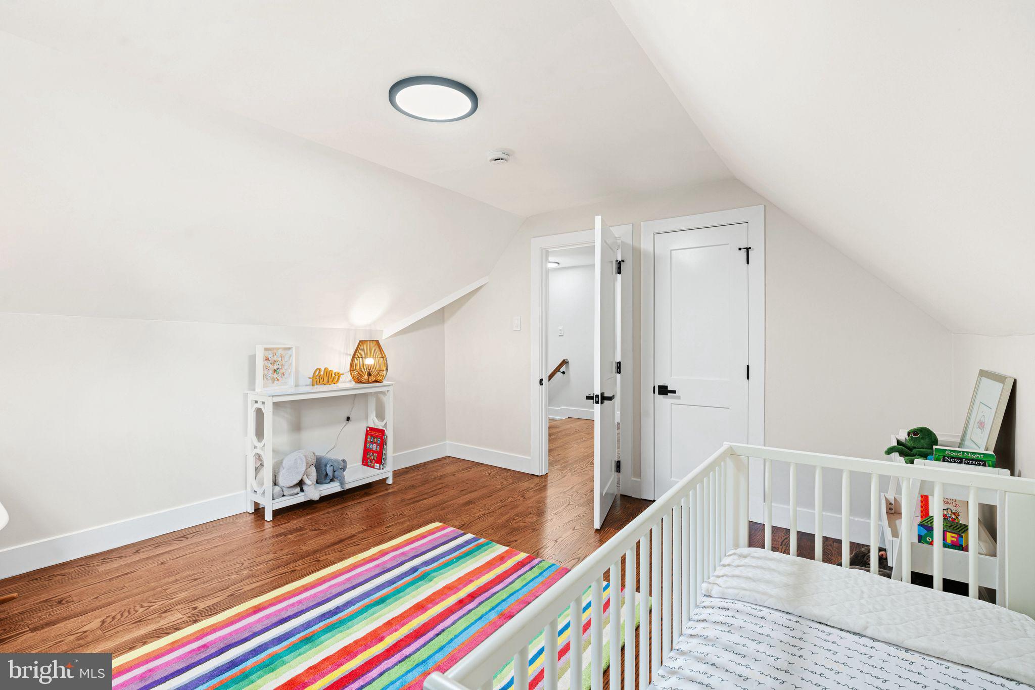 116 Rhoads Avenue Haddonfield, NJ 08033 - Photo 20 of 29 a bedroom with furniture and a book shelf
