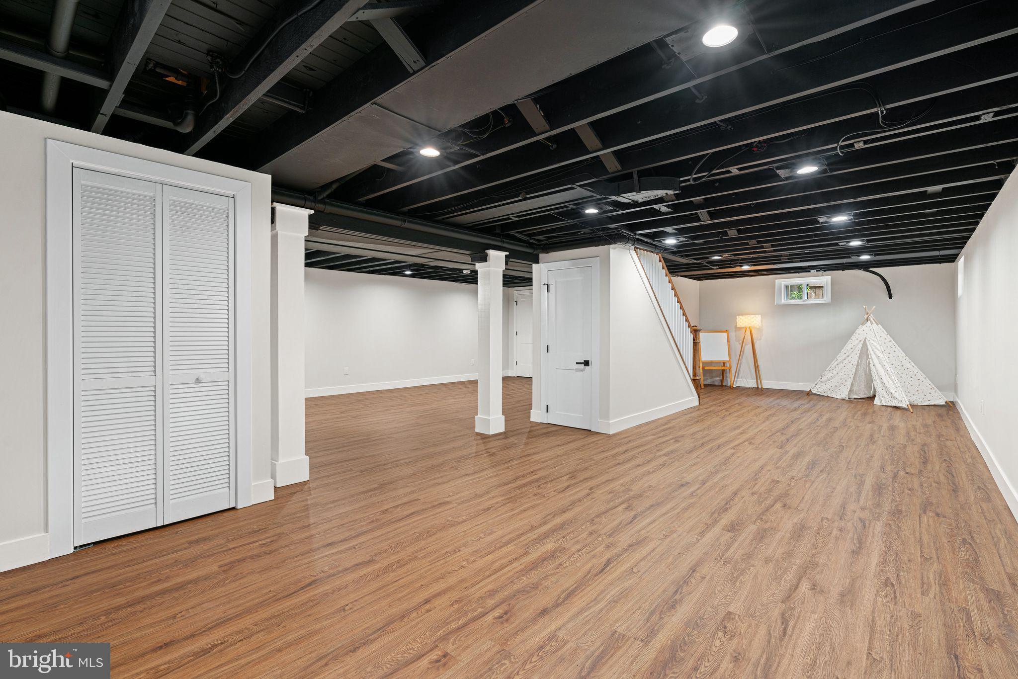 116 Rhoads Avenue Haddonfield, NJ 08033 - Photo 22 of 29 a view of empty room with wooden floor